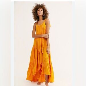 Free People "Bare It All" maxi dress in a yellow/orange color. XS fits oversized